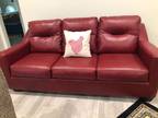 Bay red practically new loveseat and couch