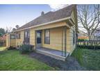 Charming fixer-upper duplex on a spacious fenced lot.