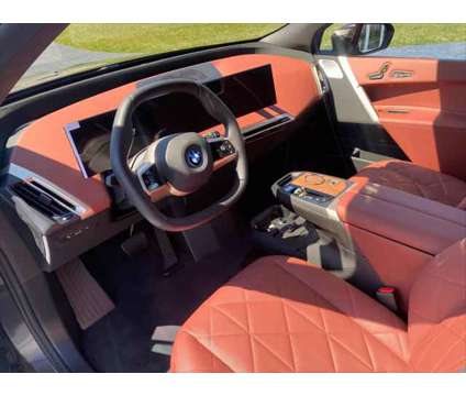 2024 BMW iX M60 is a Black 2024 BMW 325 Model iX SUV in Mechanicsburg PA