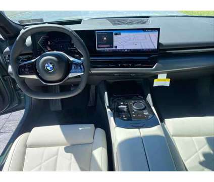 2024 BMW 5 Series i xDrive is a Green 2024 BMW 5-Series Sedan in Mechanicsburg PA