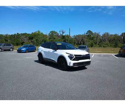 2023 Kia Sportage X-Pro Prestige is a Black, White 2023 Kia Sportage 4dr SUV in Leesburg FL