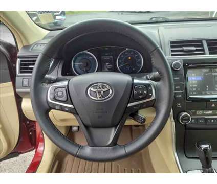 2017 Toyota Camry Hybrid XLE is a 2017 Toyota Camry Hybrid XLE Hybrid in Cocoa FL