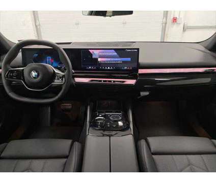 2024 BMW 5 Series i xDrive is a Blue 2024 BMW 5-Series Sedan in Erie PA