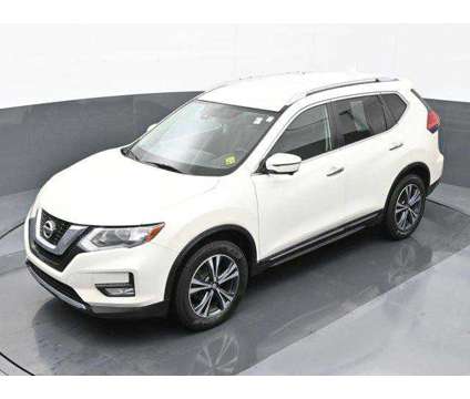 2017 Nissan Rogue SL is a White 2017 Nissan Rogue SL Car for Sale in Michigan City IN