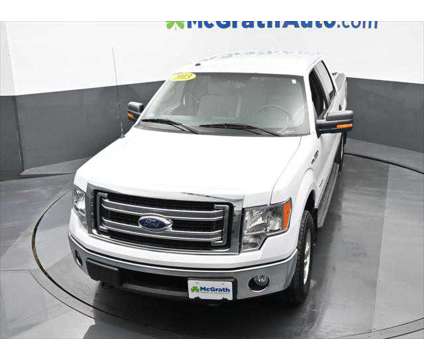 2013 Ford F-150 XLT is a White 2013 Ford F-150 XLT Truck in Dubuque IA