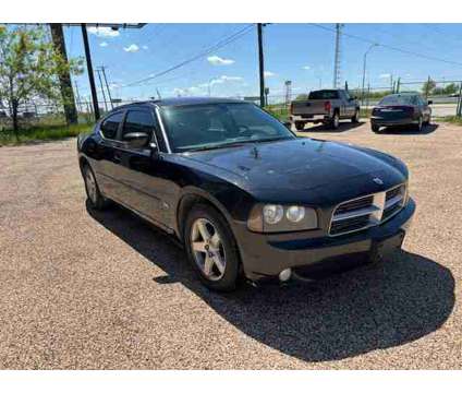 2010 Dodge Charger for sale is a Black 2010 Dodge Charger Car for Sale in Jarrell TX