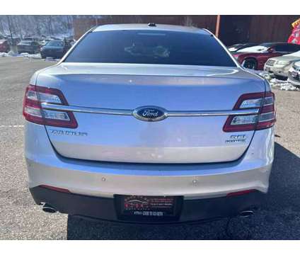 2015 Ford Taurus for sale is a Grey 2015 Ford Taurus Car for Sale in Saint Paul MN
