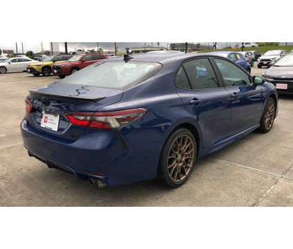 2024 Toyota Camry SE Nightshade is a Blue 2024 Toyota Camry SE Car for Sale in Hattiesburg MS