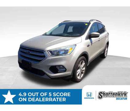 2018UsedFordUsedEscapeUsedFWD is a Gold, White 2018 Ford Escape Car for Sale in Decatur AL