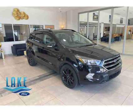 2019UsedFordUsedEscapeUsed4WD is a Black 2019 Ford Escape Car for Sale in Milwaukee WI