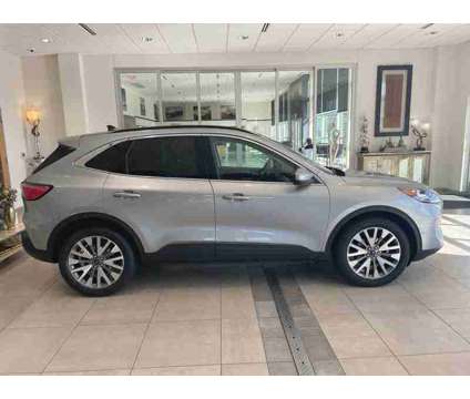 2021UsedFordUsedEscapeUsedAWD is a Silver 2021 Ford Escape Car for Sale in Milwaukee WI