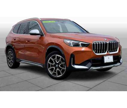 2023NewBMWNewX1NewSports Activity Vehicle is a Orange 2023 BMW X1 Car for Sale in Stratham NH
