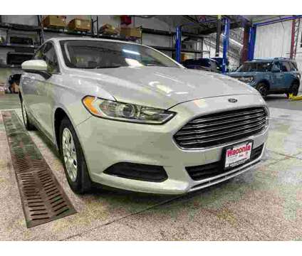 2014UsedFordUsedFusionUsed4dr Sdn FWD is a Silver 2014 Ford Fusion Car for Sale in Waconia MN