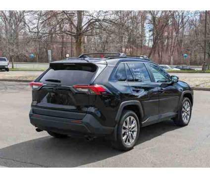 2021 Toyota RAV4 XLE Premium is a Black 2021 Toyota RAV4 XLE Car for Sale in Manchester CT