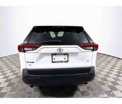 2022 Toyota RAV4 LE is a White 2022 Toyota RAV4 LE Car for Sale in Tampa FL