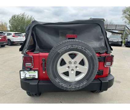 2012 Jeep Wrangler Sport is a Red 2012 Jeep Wrangler Sport Car for Sale in Murfreesboro TN