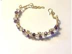 Gold bracelet with Purple and Clear Crystals