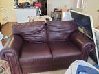Leather love seat and couch.