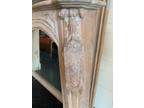 Hand carved fireplace mantel and mirror