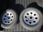 2 Used Tires Mounted On Rims For Light Truck 245-70R17