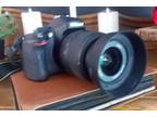 Camera, Nikon 5100 Digital SLR, with cross body fast reach case.