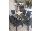 Glass dining room table and 8 chairs