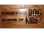 Forget the dog beware of the kids!! Solid cedar wall decor.