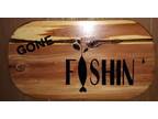 Every man's favorite thing to say! Gone Fishing cedar wooden plaque!
