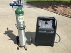 Oxygen consentrator and portable oxygen tank on wheels