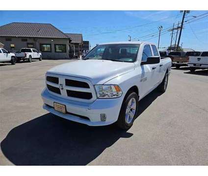 2014 Ram 1500 Quad Cab for sale is a White 2014 RAM 1500 Model Car for Sale in Abilene TX