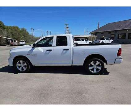 2014 Ram 1500 Quad Cab for sale is a White 2014 RAM 1500 Model Car for Sale in Abilene TX