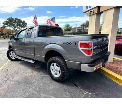 2011 Ford F150 Super Cab for sale is a Grey 2011 Ford F-150 Car for Sale in Orlando FL