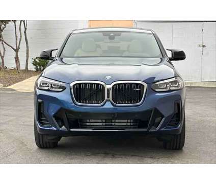 2024 BMW X4 M40i is a Blue 2024 BMW X4 M40i SUV in Seaside CA