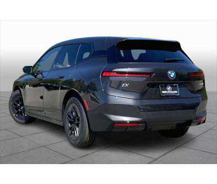 2024 BMW iX xDrive50 is a Grey 2024 BMW 325 Model iX SUV in Columbia SC