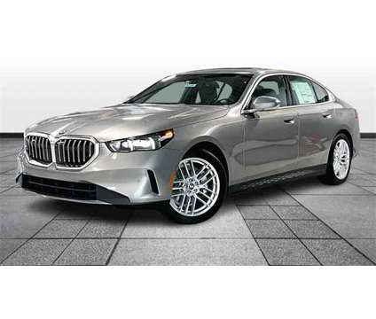 2024 BMW 5 Series i xDrive is a Grey 2024 BMW 5-Series Sedan in Grand Blanc MI