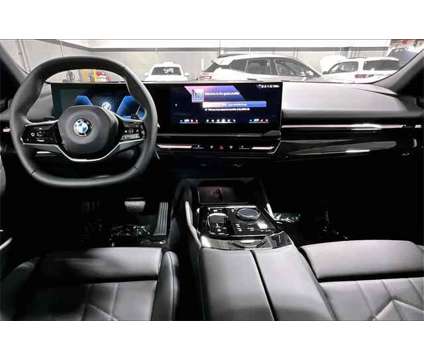 2024 BMW 5 Series i xDrive is a Grey 2024 BMW 5-Series Sedan in Grand Blanc MI