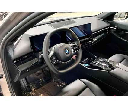 2024 BMW 5 Series i xDrive is a Grey 2024 BMW 5-Series Sedan in Grand Blanc MI