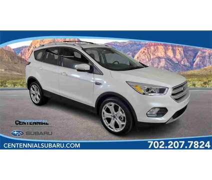2018 Ford Escape Titanium is a Silver, White 2018 Ford Escape Titanium SUV in Las Vegas NV