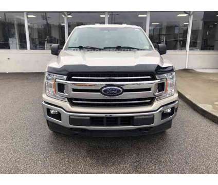 2018 Ford F-150 XLT is a Gold, White 2018 Ford F-150 XLT Truck in Saint Albans WV