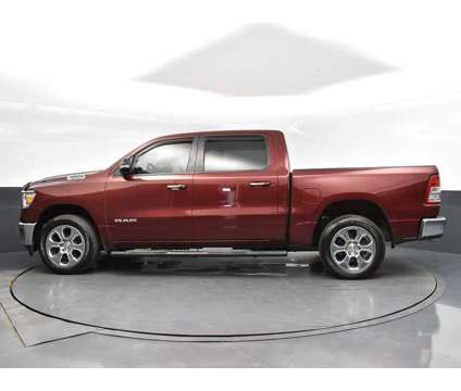 2020 Ram 1500 Big Horn/Lone Star is a Red 2020 RAM 1500 Model Big Horn Truck in Jackson MS