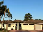 413 N Country Club Dr, Atlantis, FL 33462