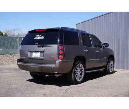 2012 GMC Yukon for sale is a Brown 2012 GMC Yukon 1500 2dr Car for Sale in Greeley CO