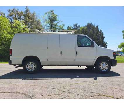 2011 Ford E150 Cargo for sale is a White 2011 Ford E150 Cargo Car for Sale in Austin TX