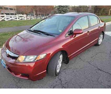 2009 Honda Civic for sale is a Red 2009 Honda Civic Car for Sale in Sterling VA