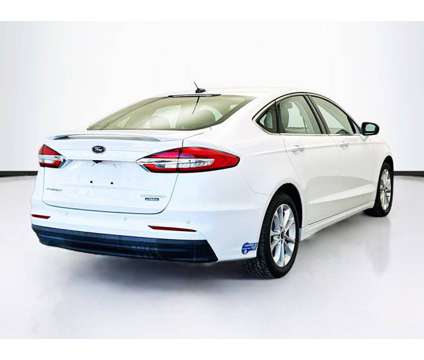 2020 Ford Fusion Energi Titanium is a White 2020 Ford Fusion Energi Titanium Sedan in Montclair CA