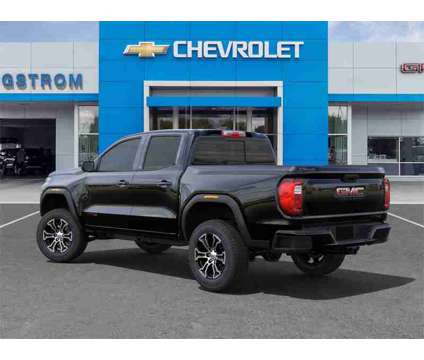 2024 GMC Canyon AT4 is a Black 2024 GMC Canyon Truck in Manitowoc WI