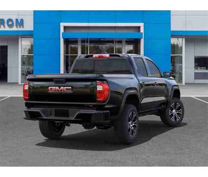 2024 GMC Canyon AT4 is a Black 2024 GMC Canyon Truck in Manitowoc WI