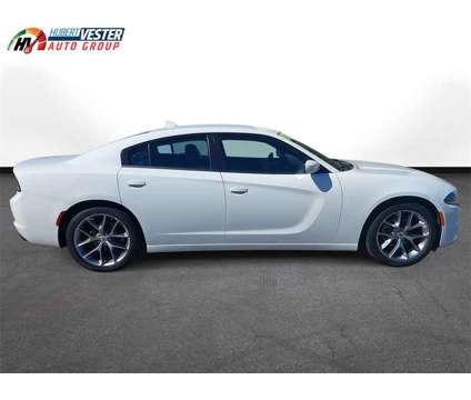 2022 Dodge Charger SXT is a White 2022 Dodge Charger SXT Sedan in Wilson NC