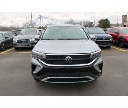 2024 Volkswagen Taos 1.5T SE is a Silver 2024 1.5T SE SUV in Bay City MI