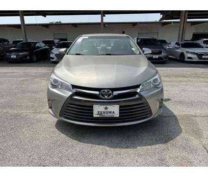 2015 Toyota Camry LE is a Gold 2015 Toyota Camry LE Sedan in Sherman TX